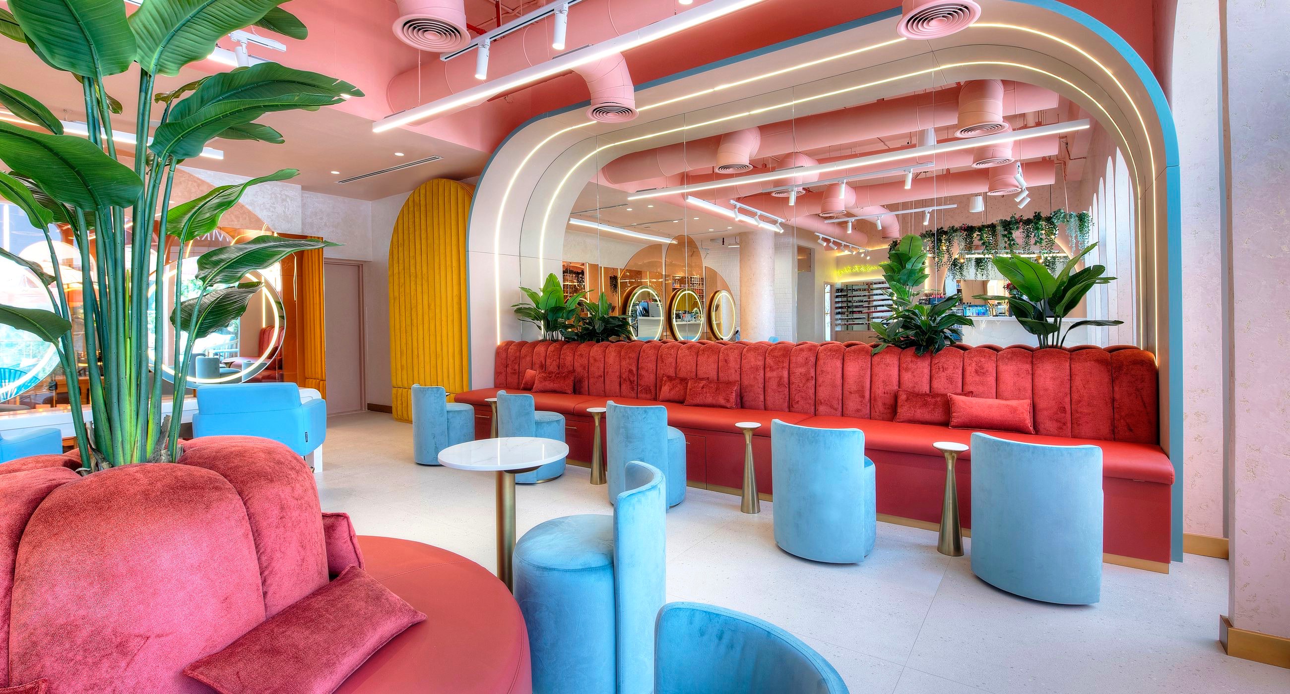 The Sheikha Fatima Park lounge with its pink arches and red banquette